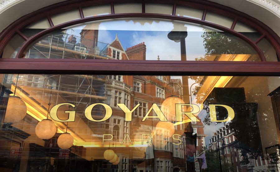 NGS Painted gold Shop Window for GOYARD Mayfair.  Sustainable signage work names Traditional sign writers of London NGS Dulwich Margate Chelsea signwriters