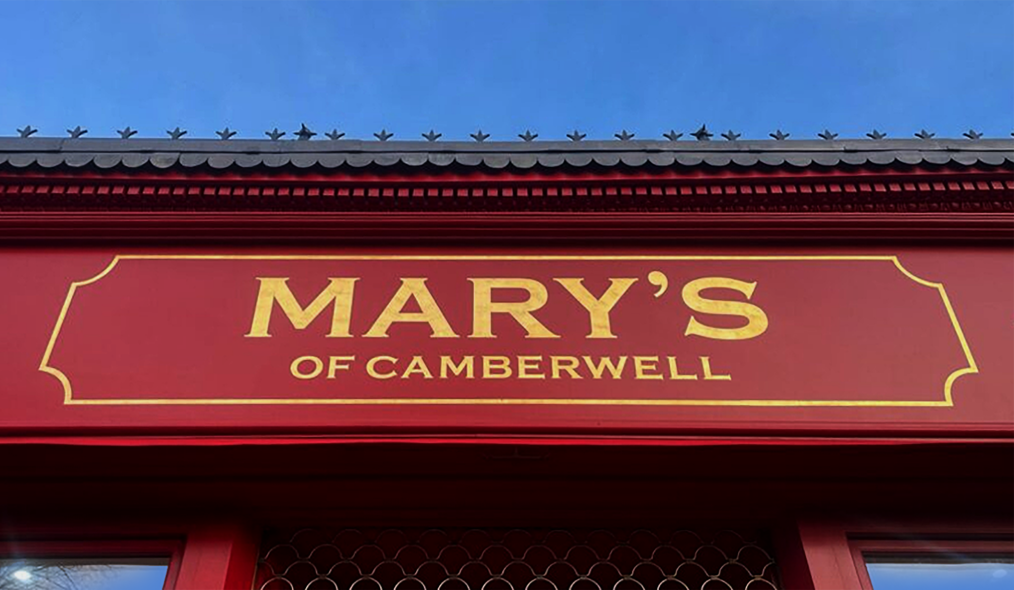 Traditional Shop sign writing.London, Mary's Nightime 2 Mary's cafe