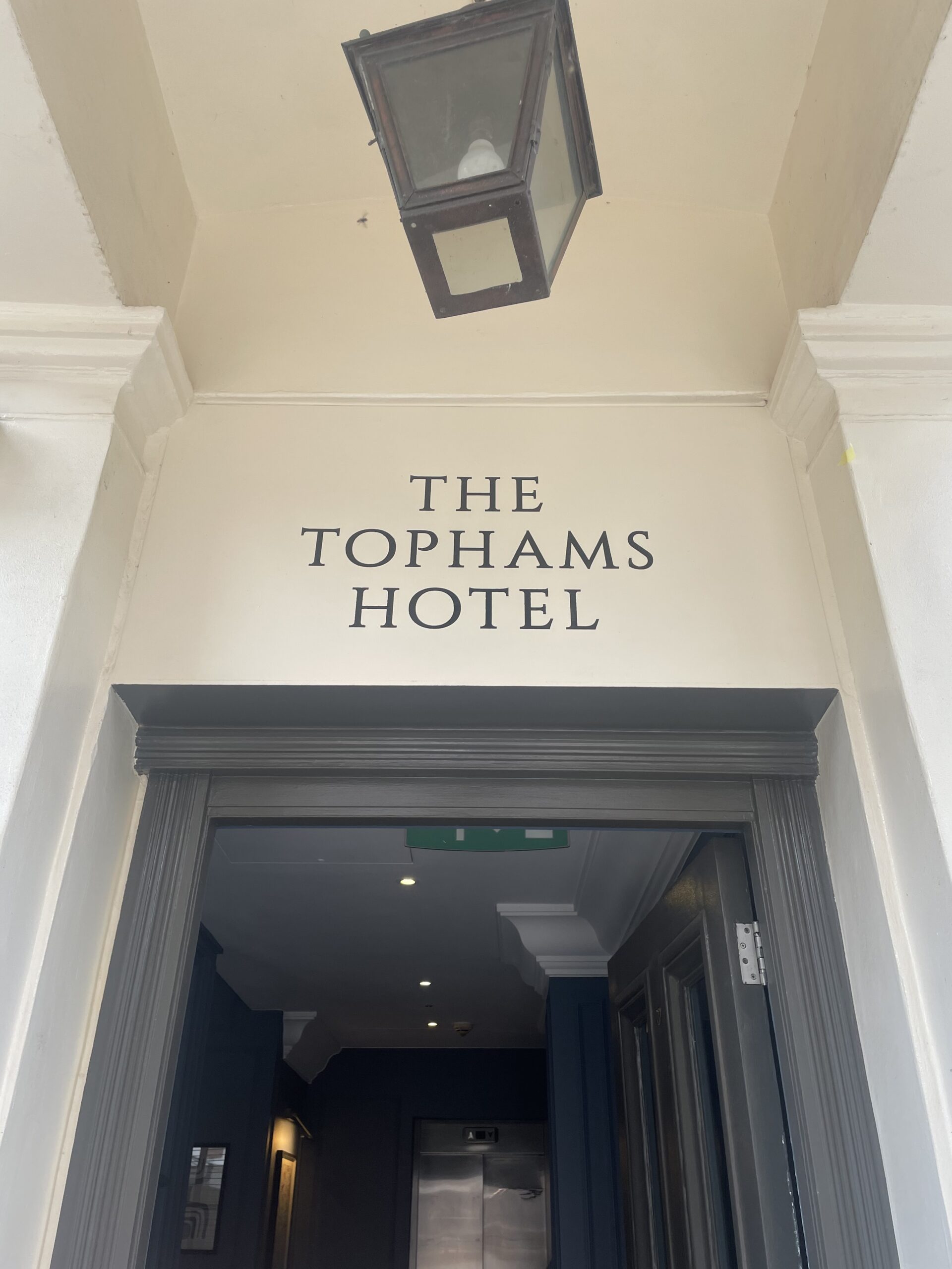 Hotel title wayfinding signage by hand painting NGS London Sign Writers Designers Tophams Hotel Chelsea & City of London Club.