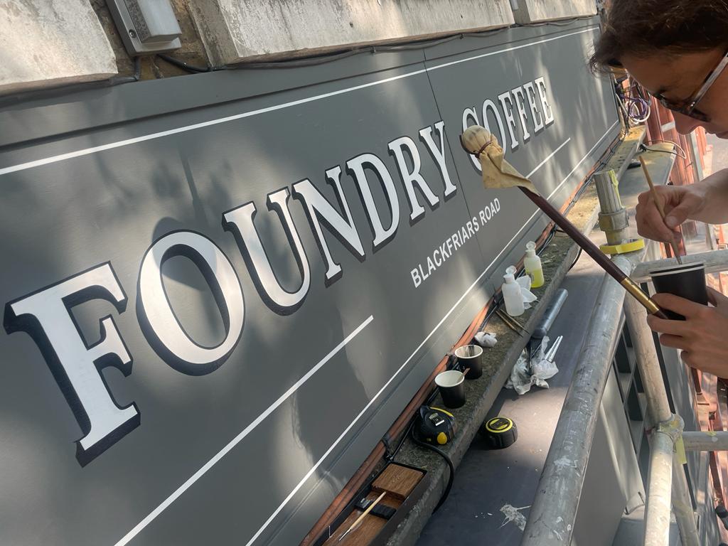 Making London Beautiful - with Traditional hand painted signs.. Large shop facade lettering