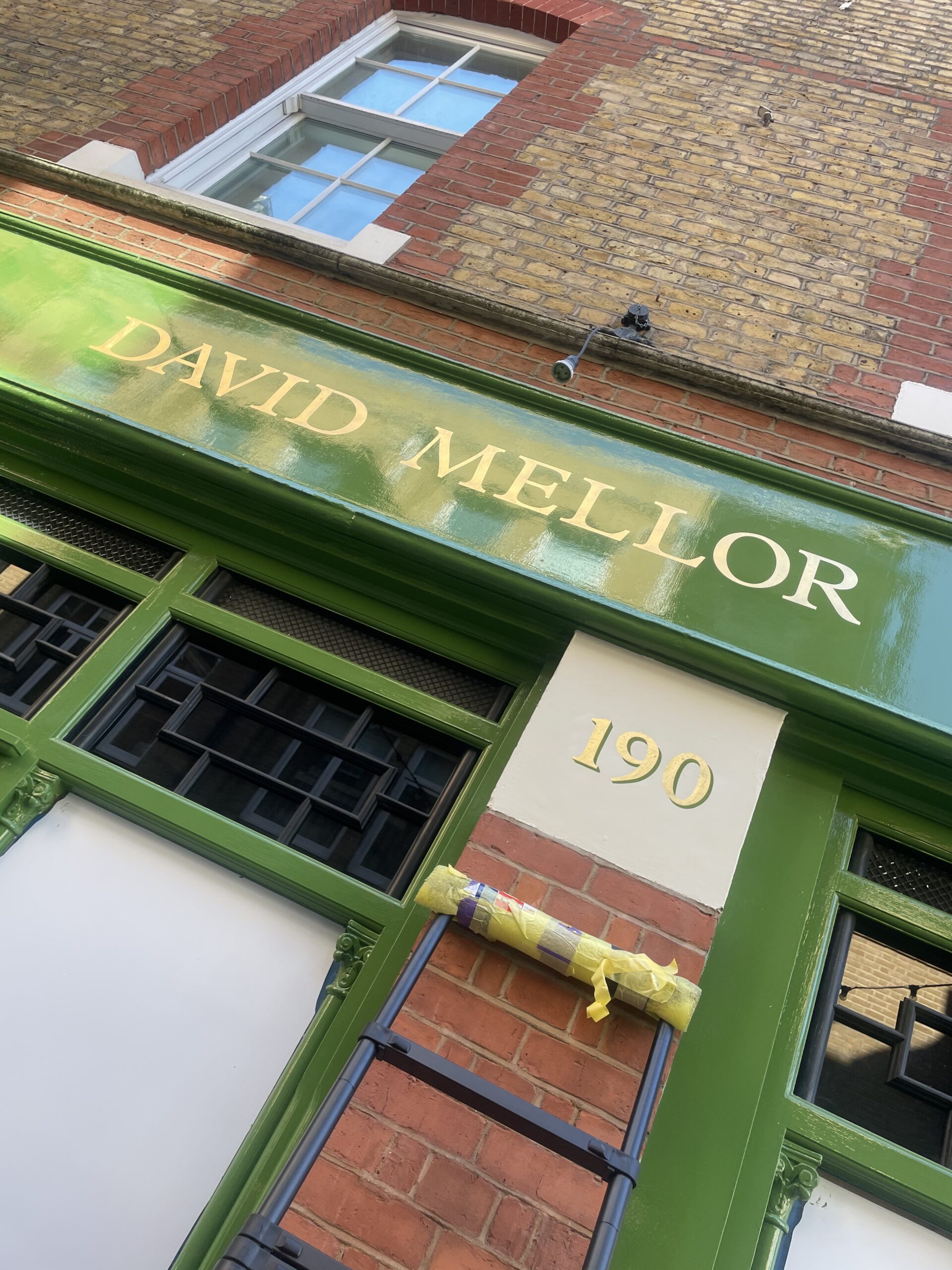 Traditional sign writer London, Shop sign writing London. David Mellor Chelsea sign writing, NGS London