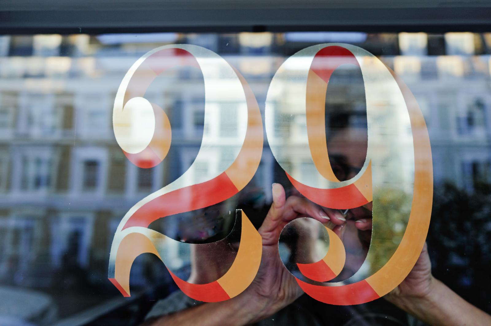 Modern Twist sign writing, Bodoni House Numbers