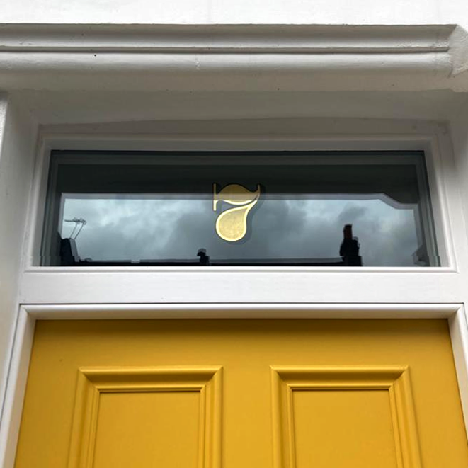 Seraina's Gold Leafed Numbers on transoms