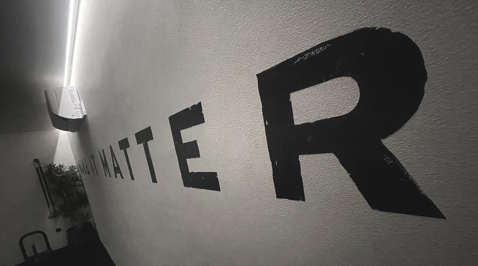 Brand ID painted onto a wall, In Gym, London