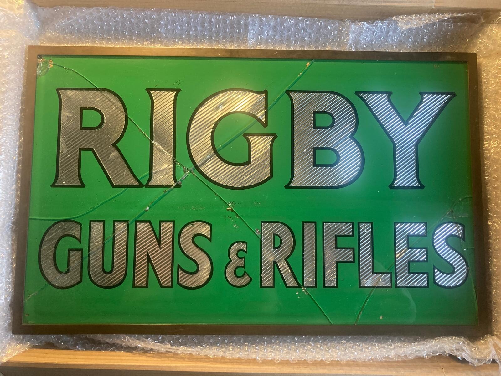 Case: Rigby Gun Makers - sign restoration. Rigby Guns makers restoration NGS signs